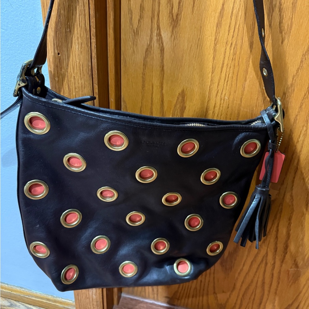Coach Black Shoulder Bag with Red and Gold Eyelets